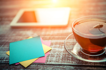 red tea with a tablet on a table in an office
