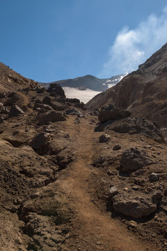Rocky path leading into the Mutnovsky volcano crater, Kamchatka, Russia