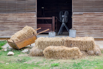 Cart with rick straw on barn