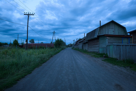 Empty streets of the remote village Kozyrevsk at sunset, Kamchatka, Russia