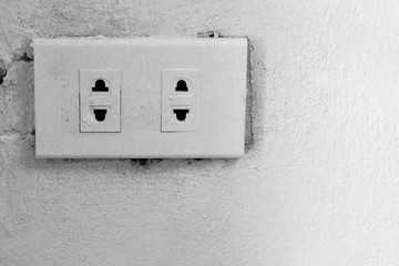 old electrical outlet on wall