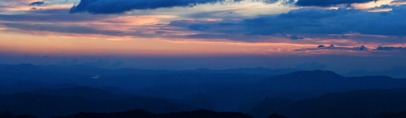 Fototapeta premium Panorama of sunset in mountains