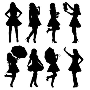 Set of female Santa silhouettes in different poses. Easy editable layered vector illustration.