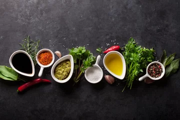 Zelfklevend Fotobehang Herbs, condiments and spices © karandaev