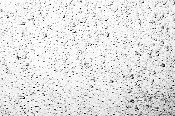 Abstract background, blurred of raining, blurred of water, selective focus, black and white image.