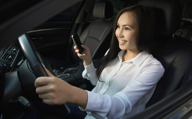 Happy woman driving