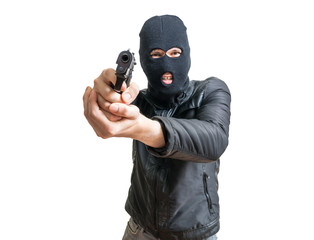 Burglar or robber aiming with pistol. Isolated on white background.