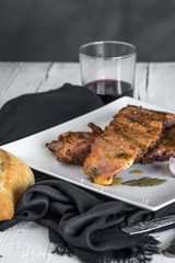 Grilled pork ribs on the wooden table