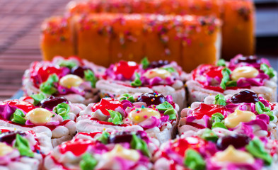 Colorful cupcakes, cake roll.