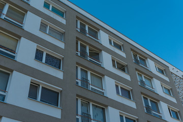 plattenbau building with brown and white facade