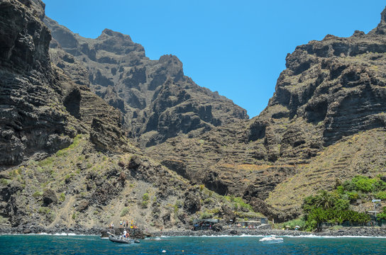 Out of the gorge (canyon) mask on the ocean shore.
