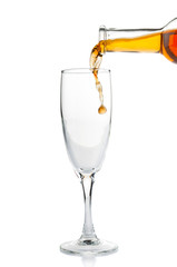 White wine pouring into wine glass