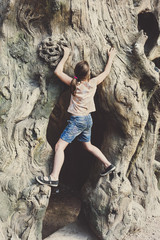 Girl child outdoors climb tree