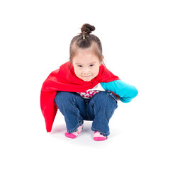 Superhero little asian girl in a red raincoat on white backgroun