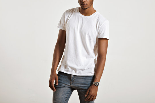 Unlabeled white cotton t-shirt presented on a muscular body of a young athlete