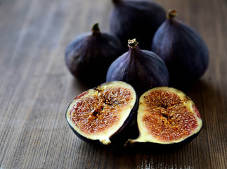 ripe figs on a wooden background
