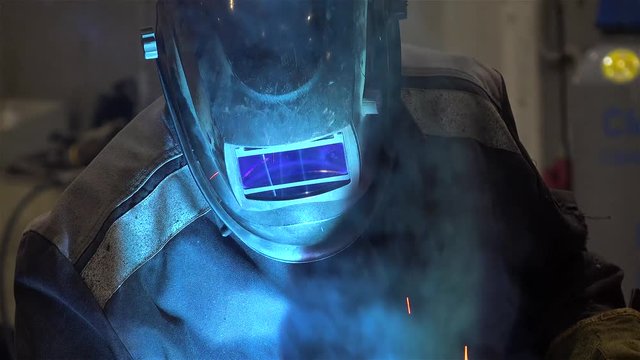 Protective working helmet during Metal arc welding.