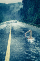 Asphalt swimmer in the rain