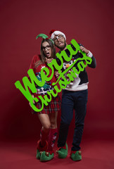 Happy nerd couple in Christmas
