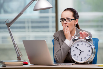 Businesswoman failing to meet challenging deadlines