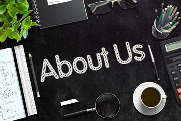 About Us Handwritten on Black Chalkboard. 3D Rendering.