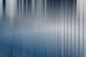 Picket fence with a motion blur effect. Image has a motion blur effect added and tonal correction. Abstract image for example for background use.