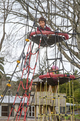 Challenging playground installation with nests and ropes for chi