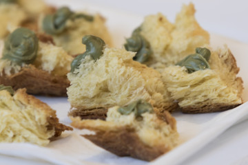 Small pieces of cake with pistachio cream