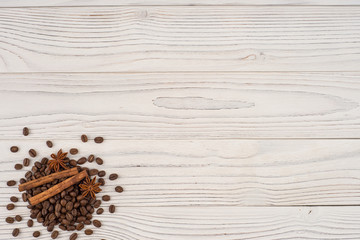 Fototapeta na wymiar Coffee with cinnamon on old wooden table.