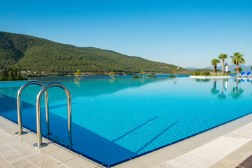 Obraz na płótnie Canvas Nice swimming pool outdoors on bright summer day