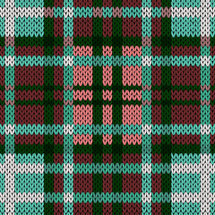 Seamless knitted pattern in red, green, turquoise and white