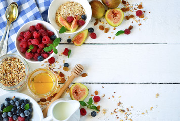 Good morning - granola with honey, berries and fruits. White woo