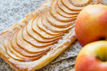 Homemade organic ruddy pies with apples puff pastry, ready to ea