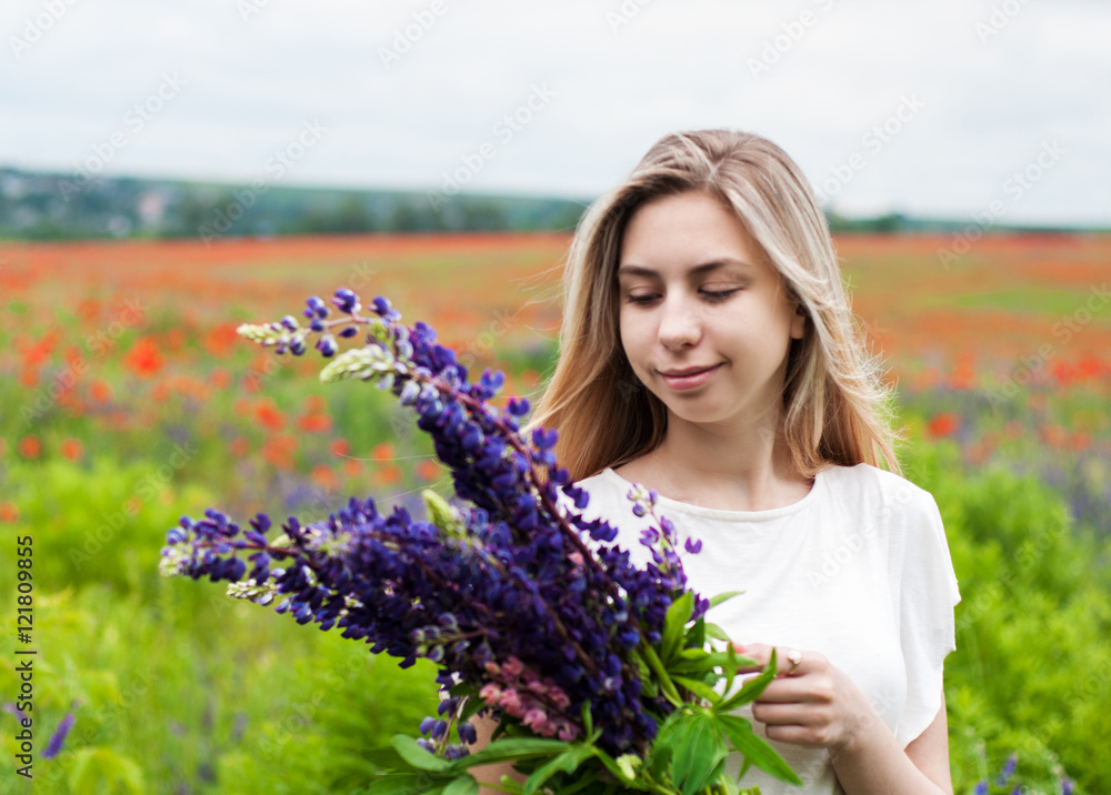 Poster girl with bouquet of lupine flowers