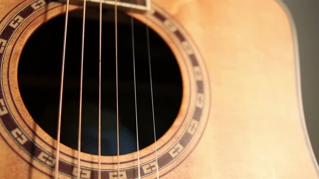 Close up view of acoustic guitar