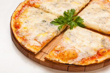 pizza on wooden cutting board
