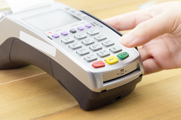 Cashier made a payment in store via EDC or credit card terminal.