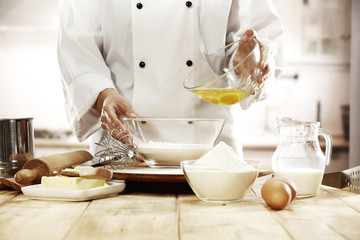 cook in kitchen interior 