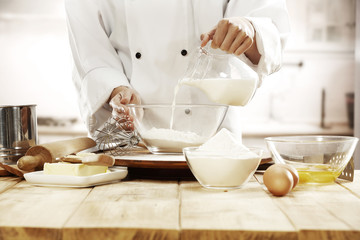 cook in kitchen interior 