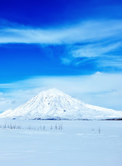 Fototapeta na wymiar Winter landscape with volcano