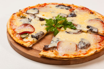 pizza on wooden cutting board