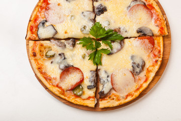 pizza on wooden cutting board