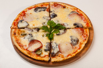 pizza on wooden cutting board