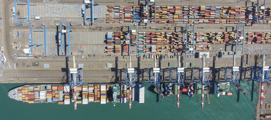 Commercial port with container ship - Aerial photo