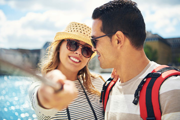 Fototapeta premium Happy attractive young woman in a trendy hat