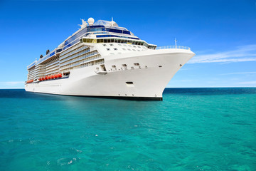 Fototapeta na wymiar Luxury cruise ship sailing to port on sunny day