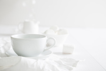 White crockery on a white table