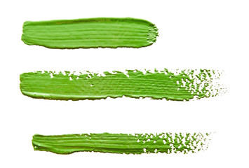  Three green strokes of the paint brush isolated