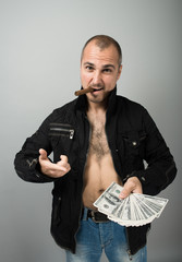 man with dollars and a cigar