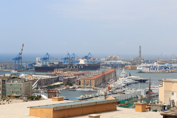 Fototapeta premium Panorama view to Port of Genoa with old lighthouse, Italy